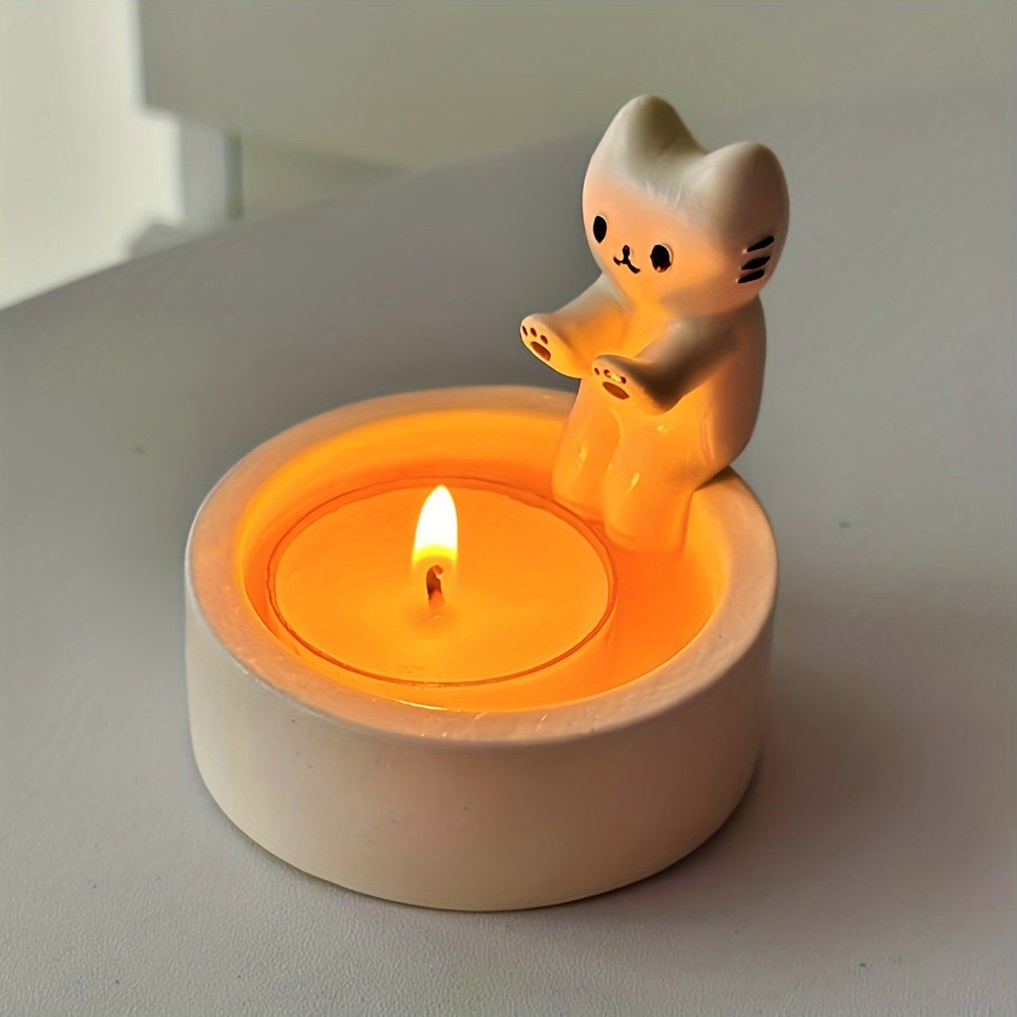 מחזיק נר חתולי בעבודת יד – כפות מתחממות 💛