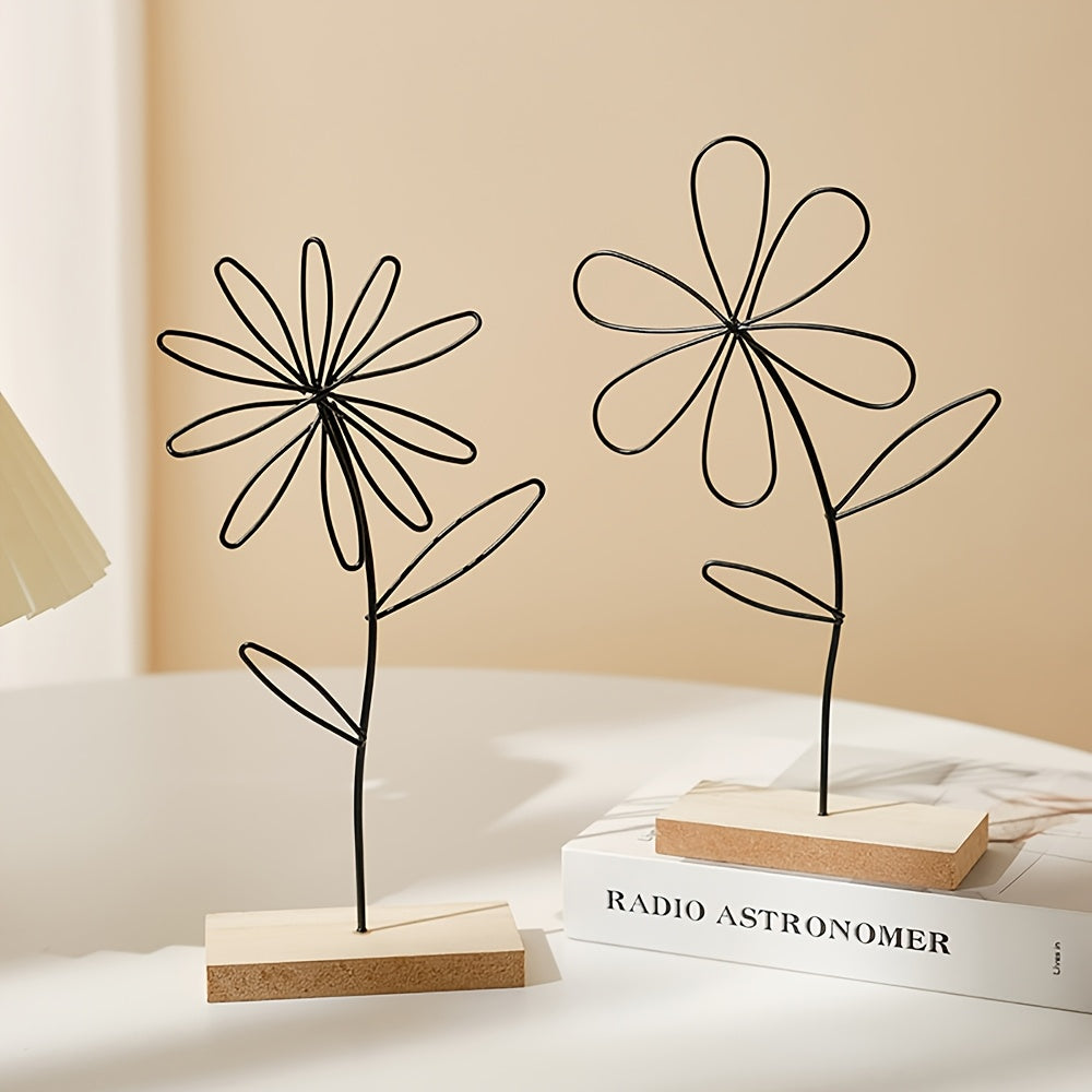 זוג פסלי פרחים מינימליסטיים – קווי מתכת שחורים על בסיס עץ