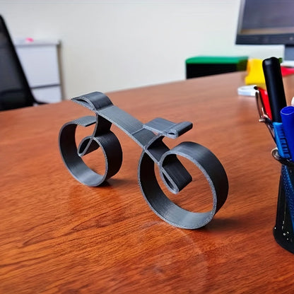 פסל אופניים מינימלי מברזל — נגיעה קטנה של סטייל לכל מדף