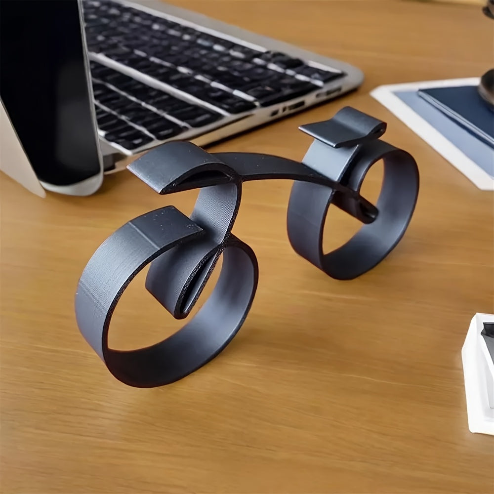 פסל אופניים מינימלי מברזל — נגיעה קטנה של סטייל לכל מדף