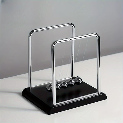 נדנדת ניוטון בעיצוב מודרני – נגיעה של סדר ושקט לכל חלל