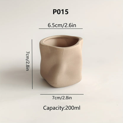 מחזיק נר קרמי בעיצוב גאומטרי – טאץ' חמים ומינימליסטי לכל פינה